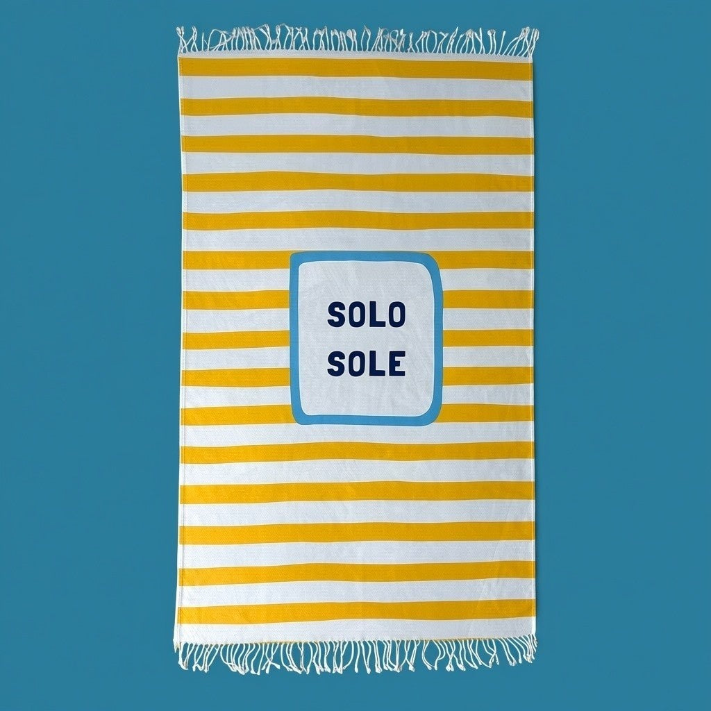 Fouta Limone&Sole Solo Sole en coton turc à rayures jaunes et blanches avec franges et inscription centrale