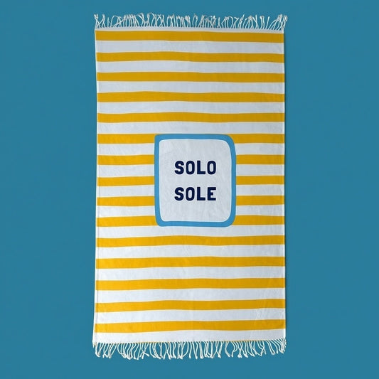 Fouta Limone&Sole Solo Sole en coton turc à rayures jaunes et blanches avec franges et inscription centrale